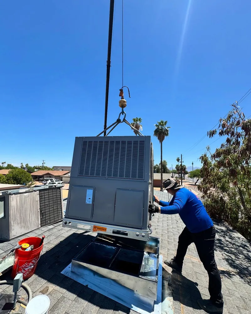 Crane lift rooftop HVAC install